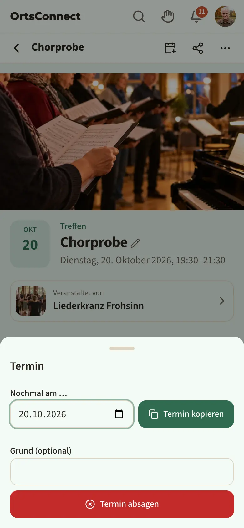 geöffnetes Fenster „Termin“ mit Bereich „Nochmal am …“ (Datum, Knopf „Termin kopieren“) und darunter Grund-Feld und roter Knopf „Termin absagen“